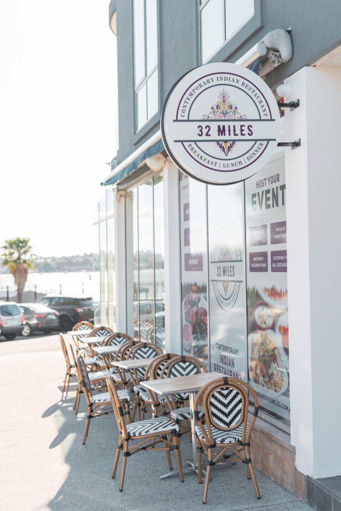 Outdoor Seating with Scenic Waterviews at 32 Miles Indian Restaurant